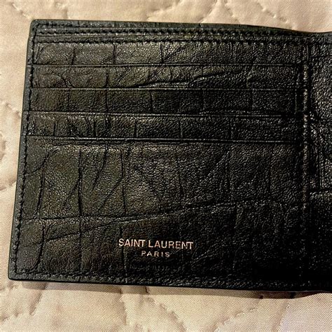 ysl alligator wallet|CASSANDRE East/West wallet in CROCODILE.